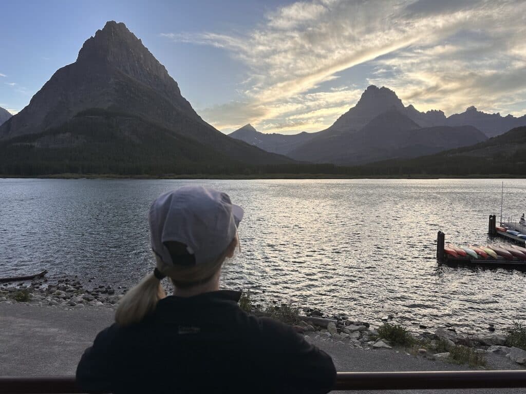 sunset at the many glacier hotel in september--the best time to visit glacier national park