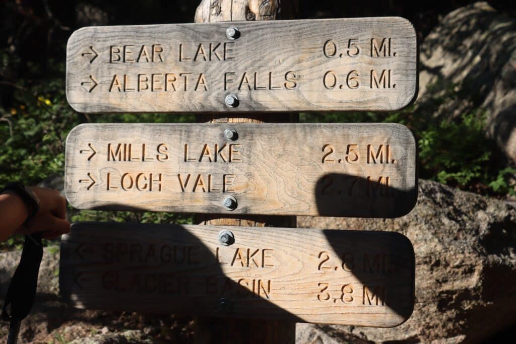 a sign for the trails in the bear lake area